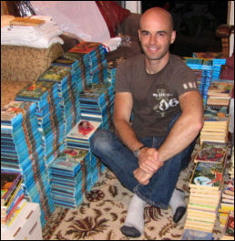 Photo of Will with books